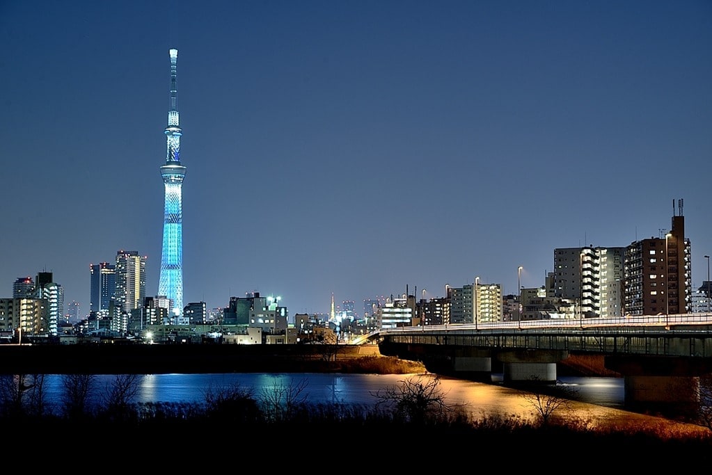 The view of Tokyo Skytree lit up at night and Sumida River