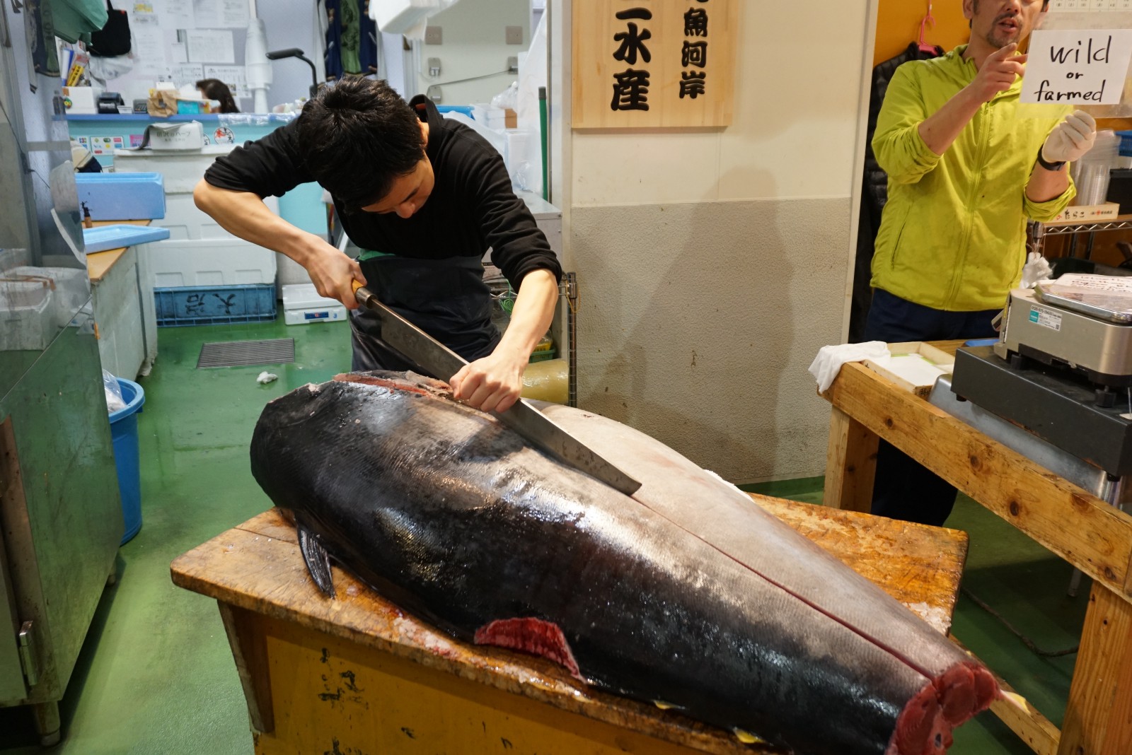 A man cutting tuna at Tsukiji