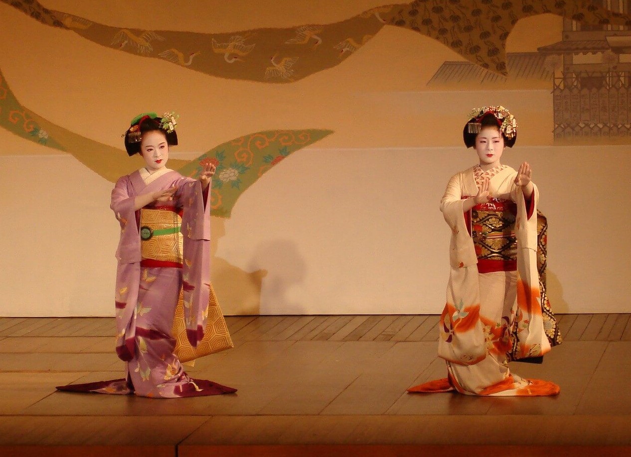 Geisha girls dancing on a stage