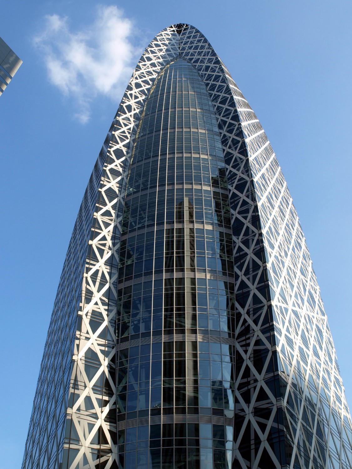 Башня работа. Здание Cocoon Tower в Токио. Mode Gakuen Cocoon Tower, Токио, Япония. Башня Mode Gakuen Cocoon Tower. Mode Gakuen Cocoon Tower Кэндзо Тангэ.