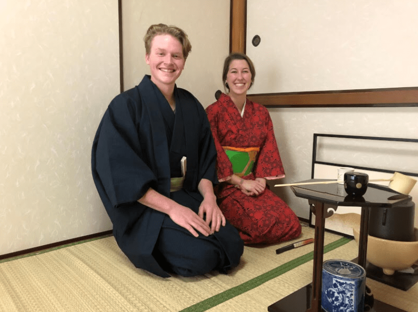 People who are enjoying tea ceremony with Kimono