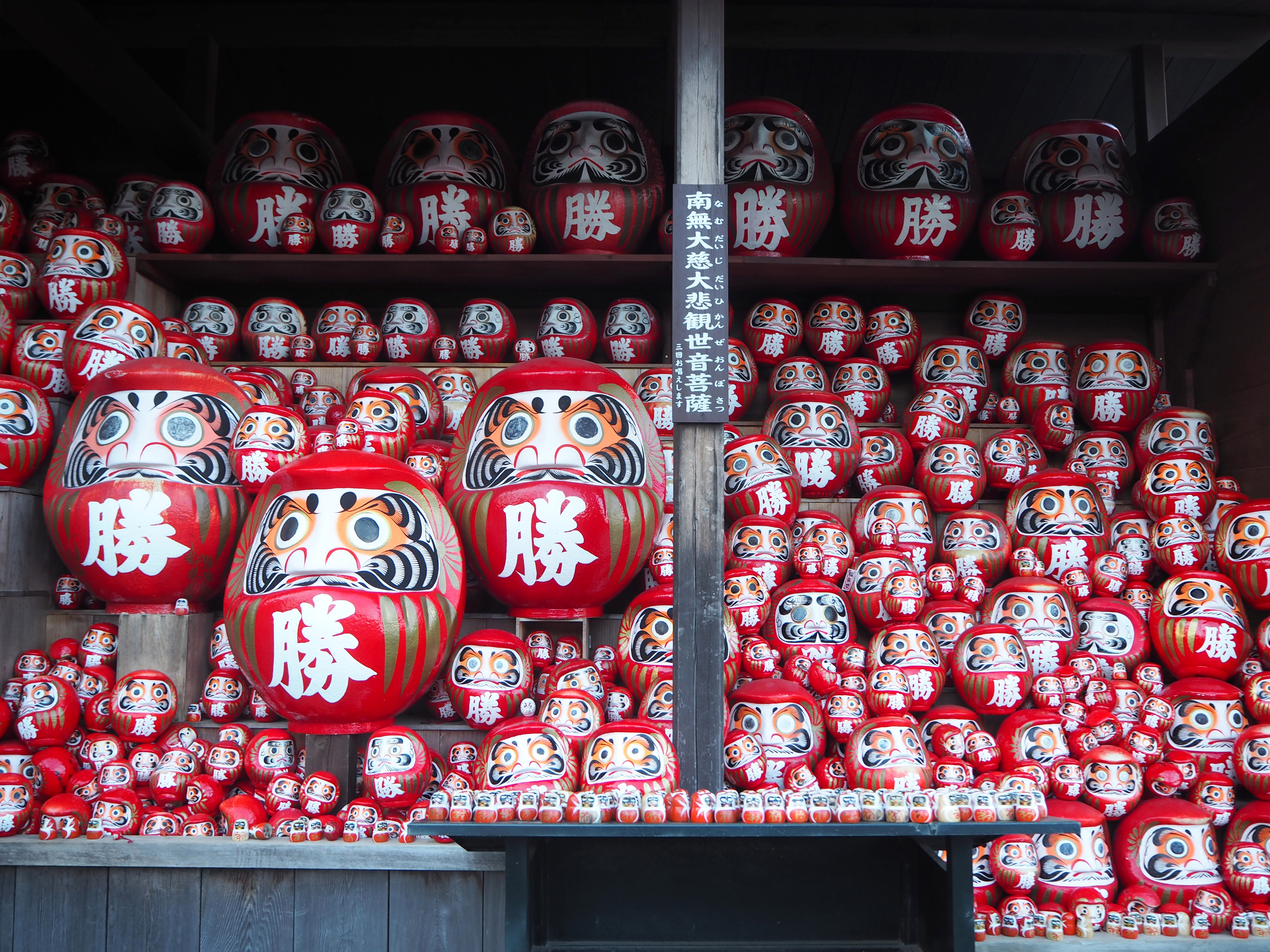 Japanese festival says thank you and goodbye to daruma good-luck