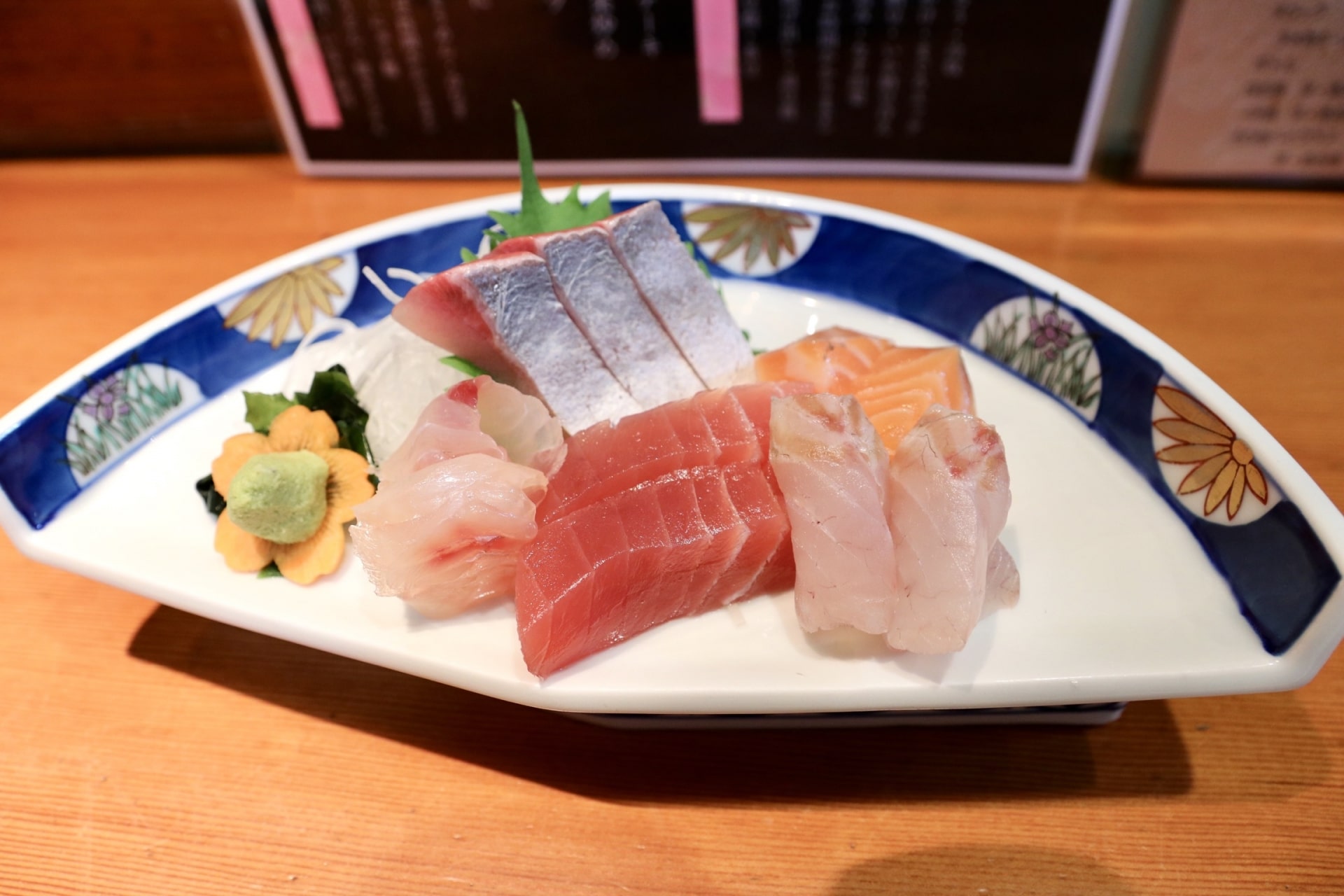 Sashimi is slices of raw fish without rice