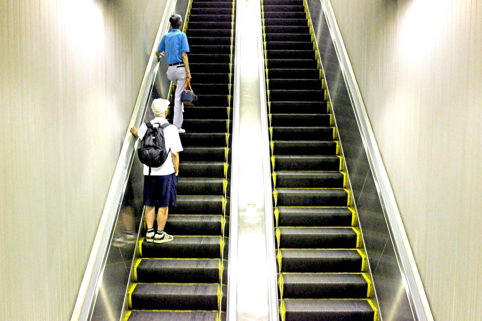 Stand to Left Escalator