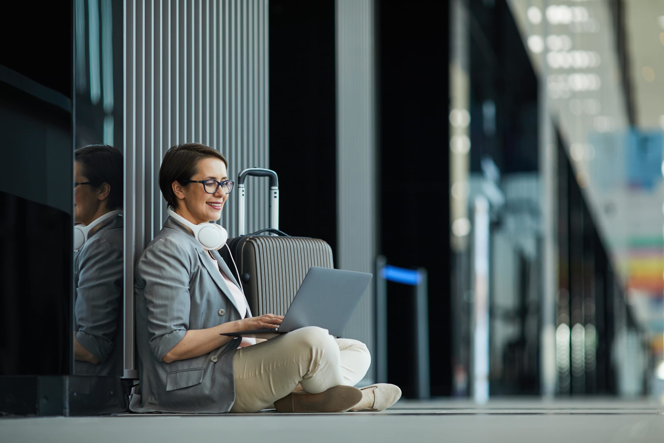 Lady using PC at airport