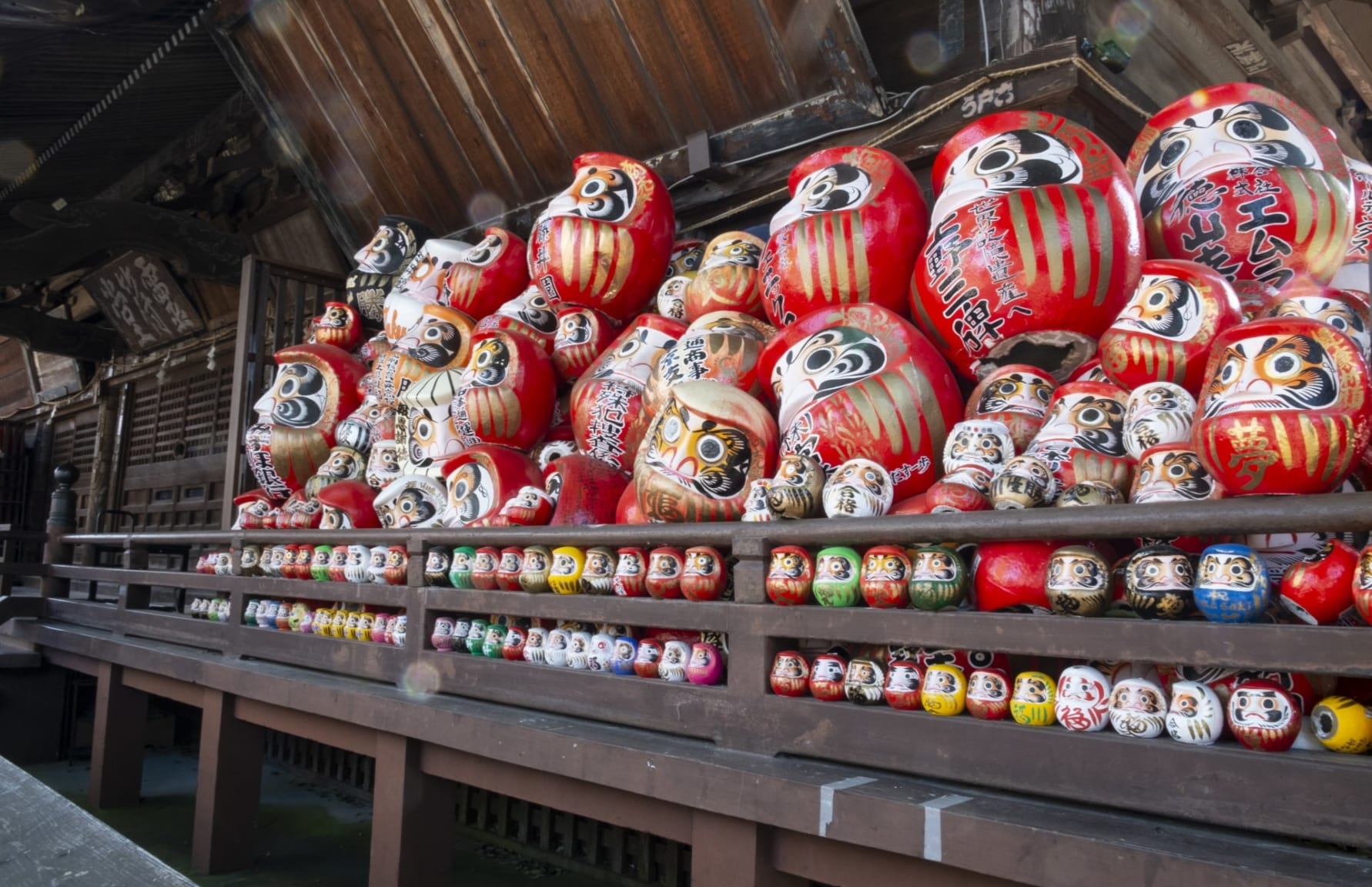 Stacked daruma at Shorinzan Daruma-ji