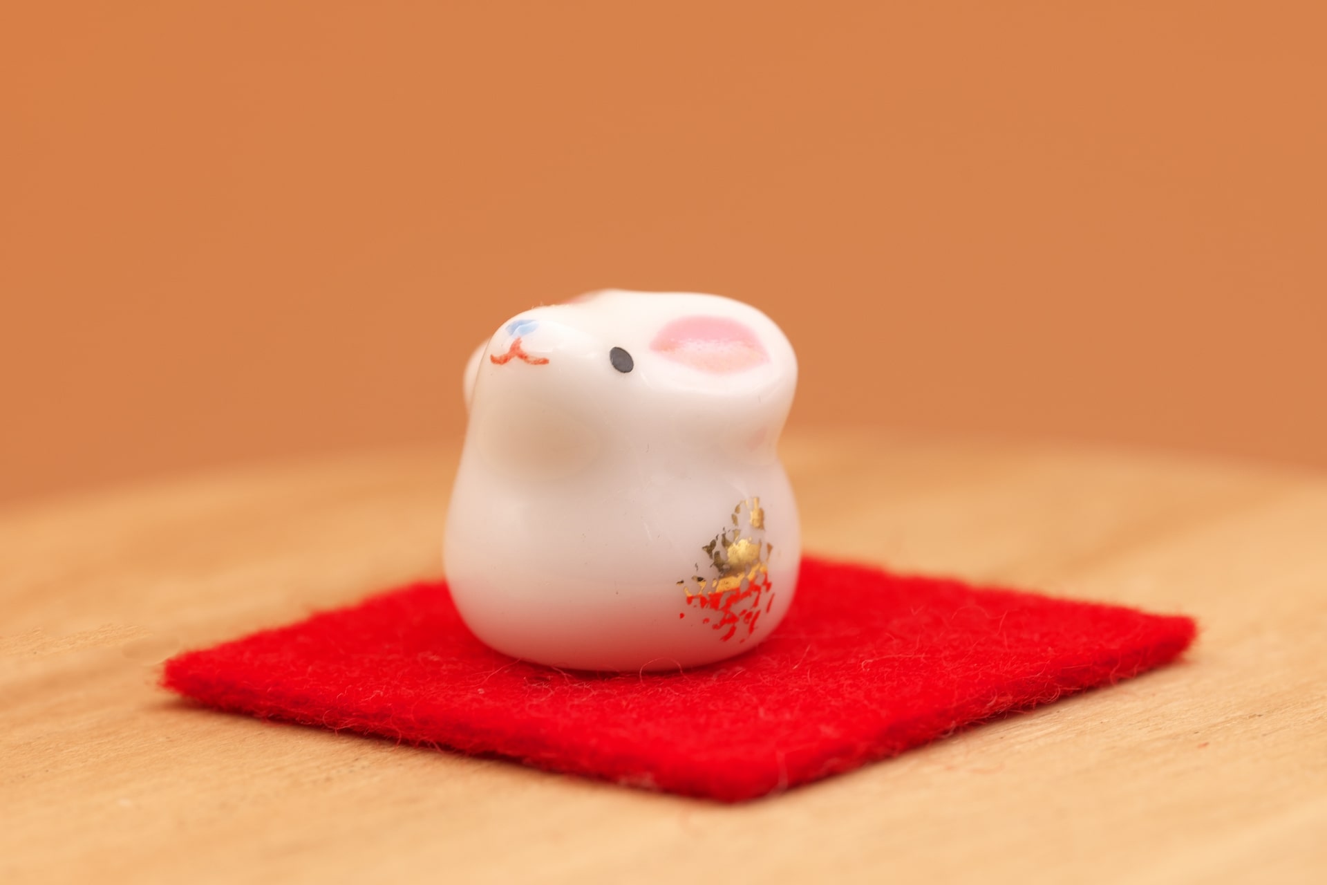 Small figurine depicting the rat from Chinese Zodiac