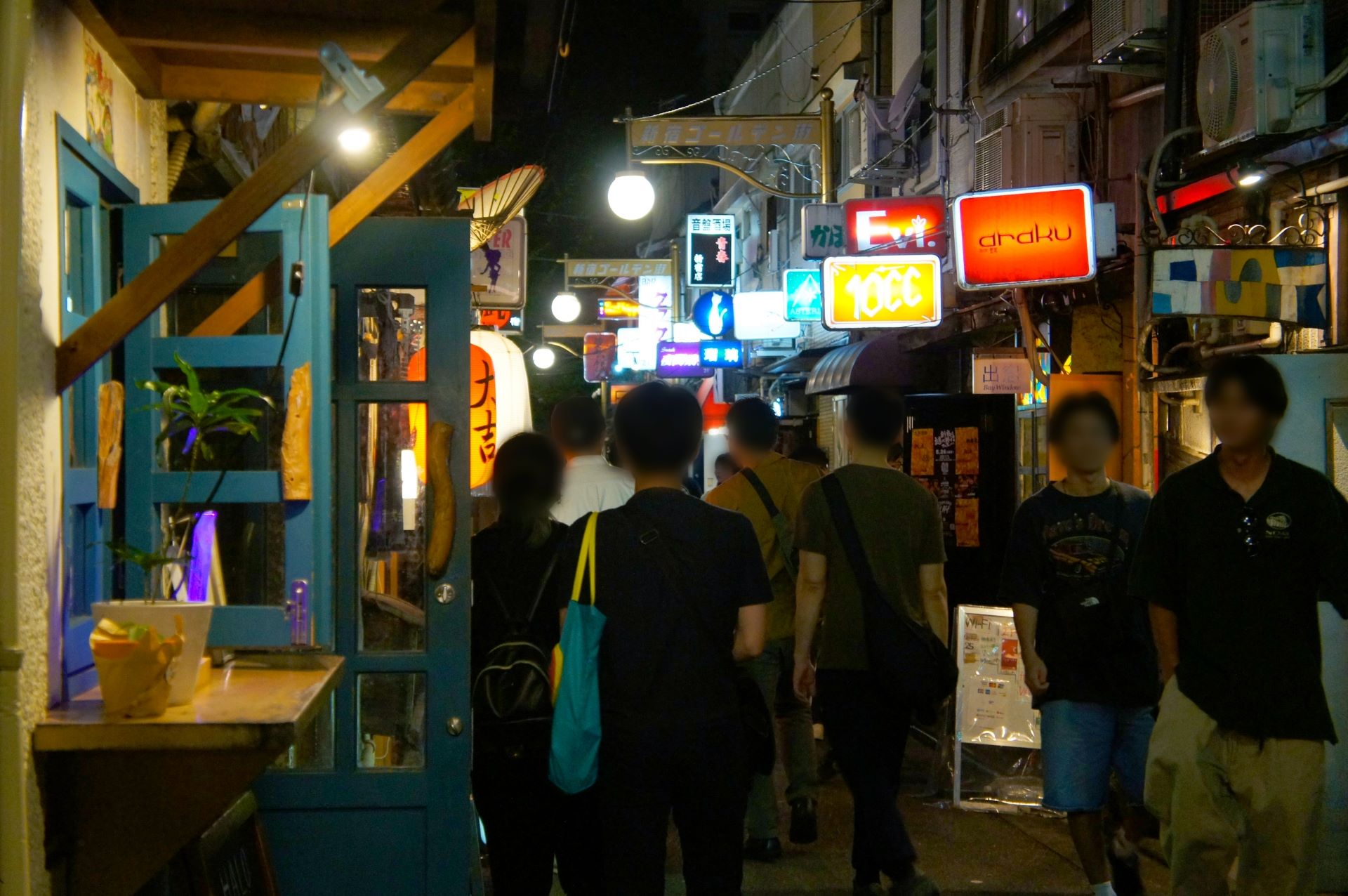Visitors and clients at Golden Gai during the night