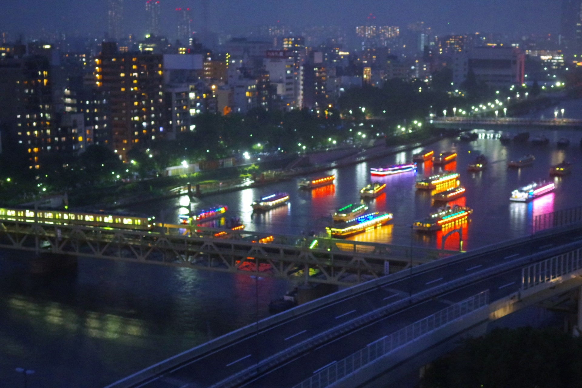 Cruise boats at Sumida River Fireworks Festival