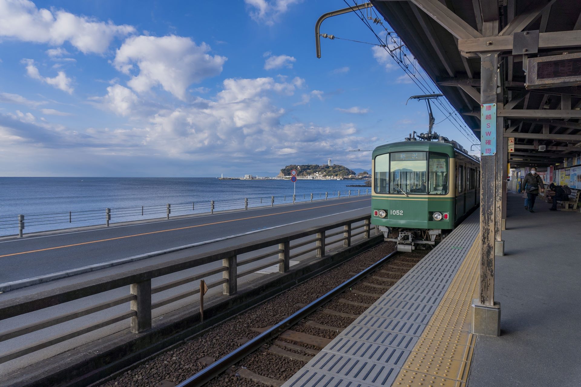 Enoden with Enoshima in the background