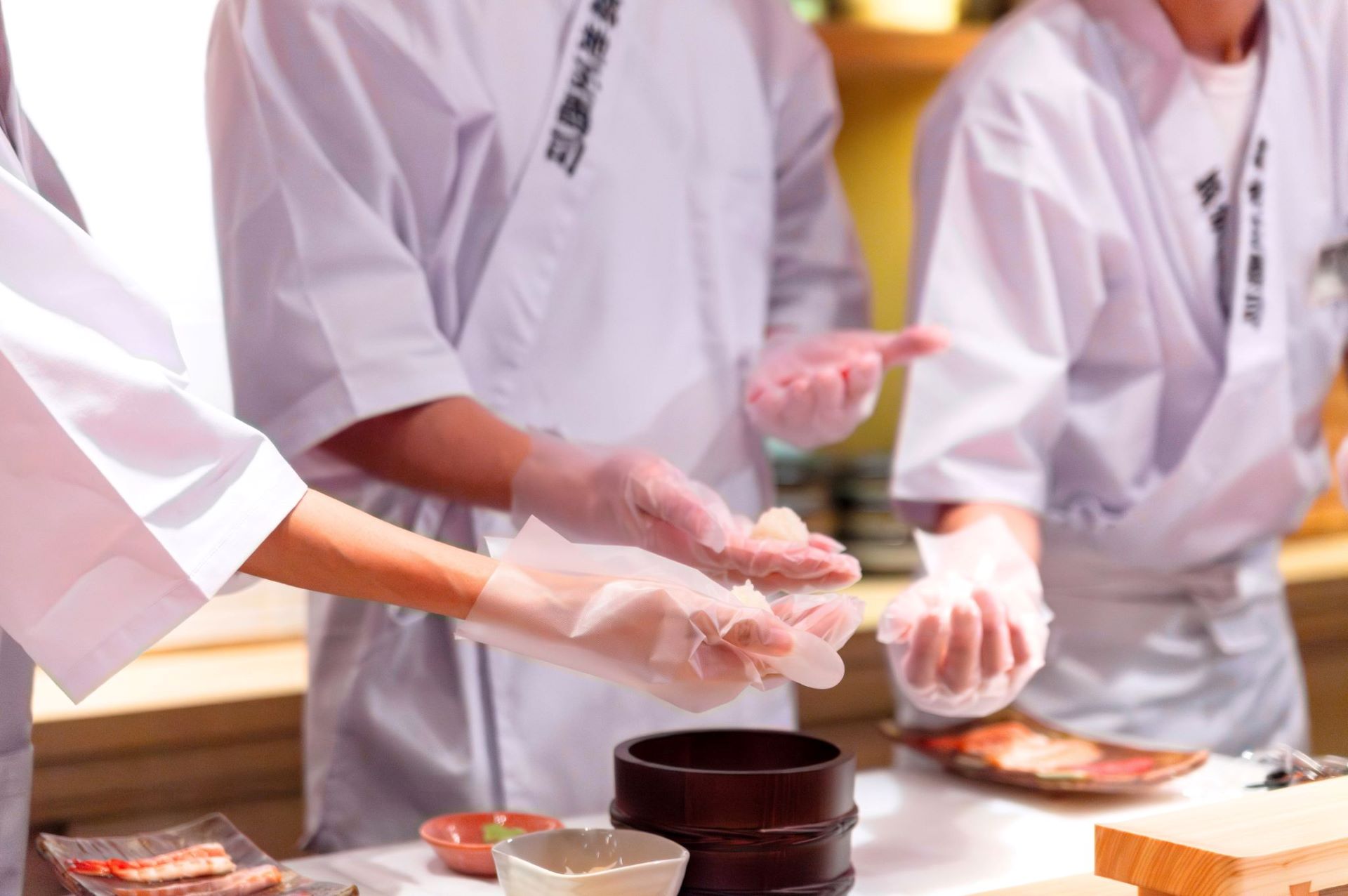 Chef explaining proper rice portion at at Sushi Nigiri Experience Asakusa Dojo