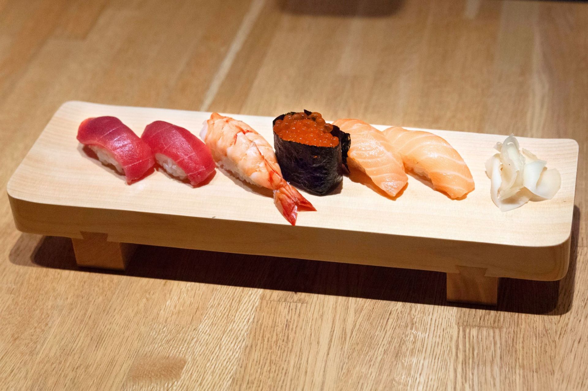 Sushi in a wooden sushi board