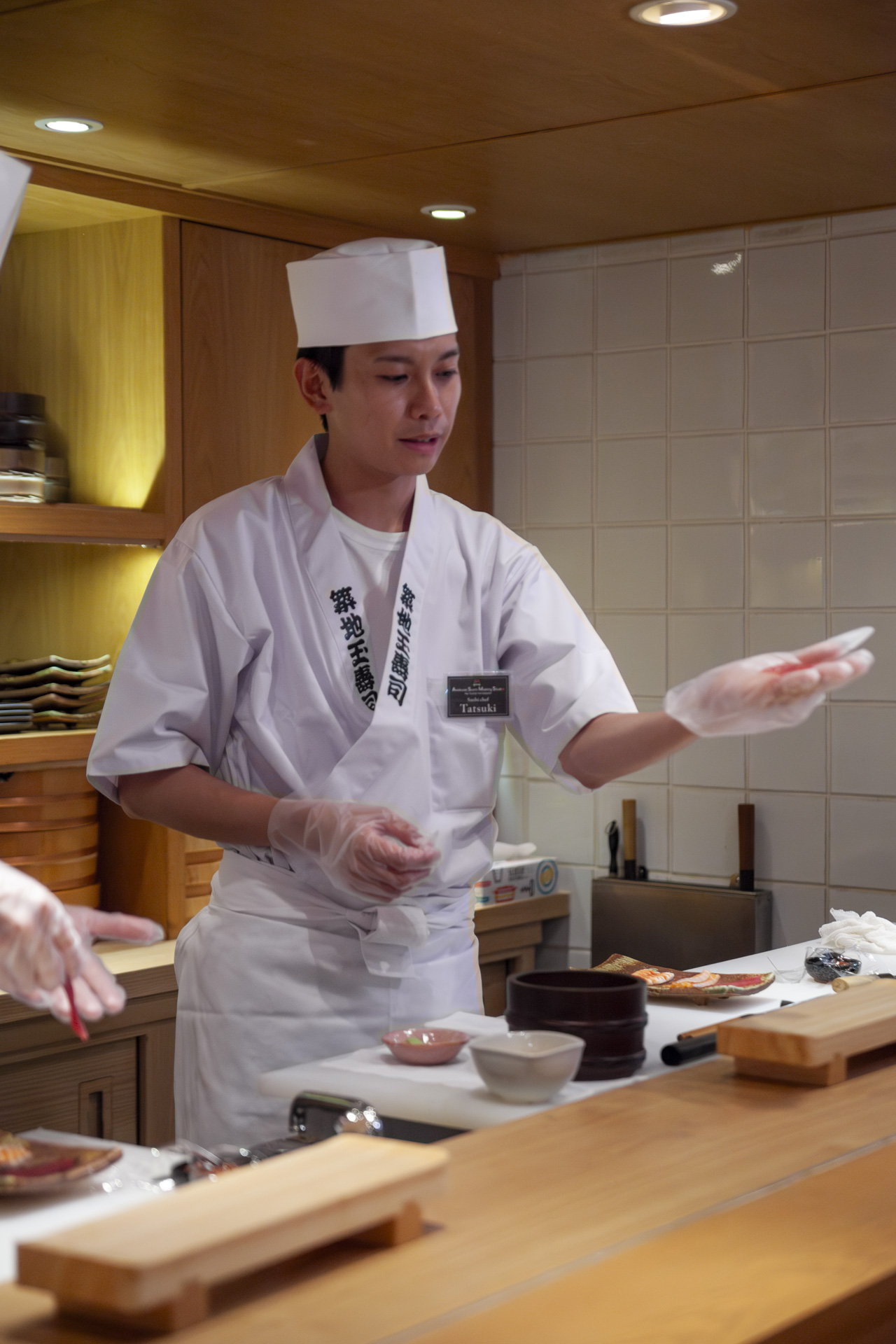 Sushi chef explaining during the sushi making experience