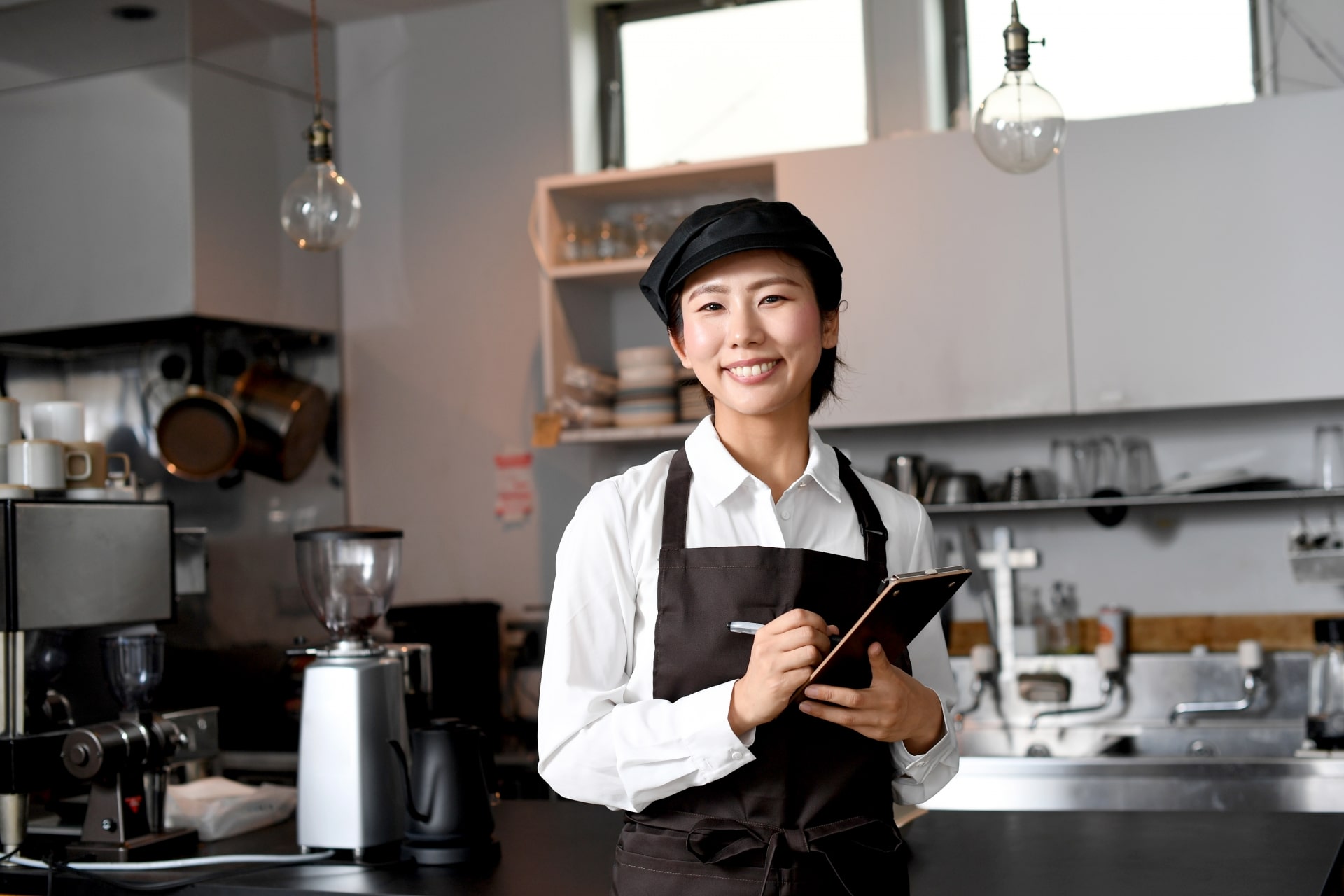 Smiling Japanese coffee shop employee