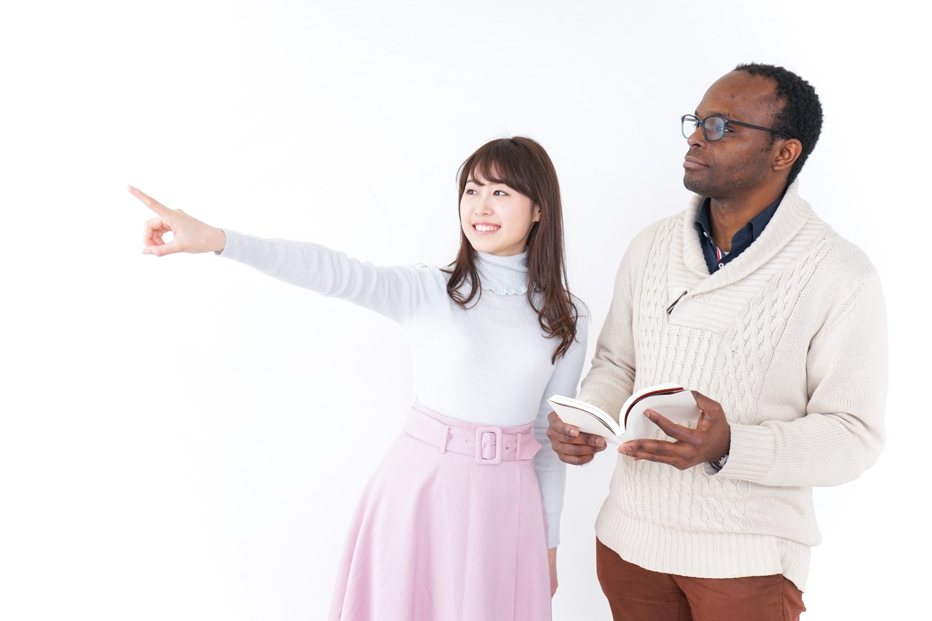 Japanese girl giving indications to foreign man