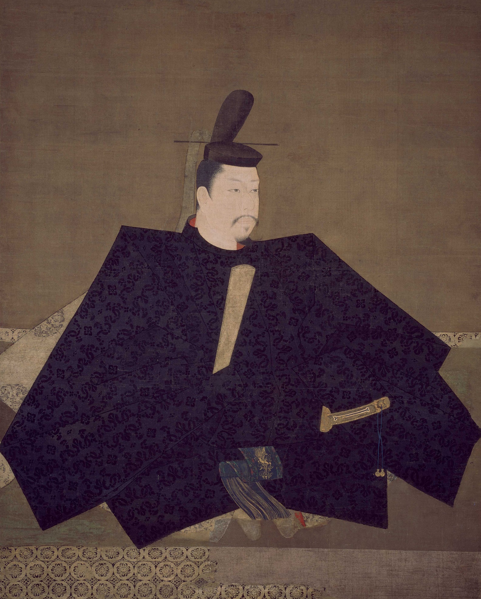 Portrait of Minamoto no Yoritomo, scroll on silk by Fujiwara Takanobu, 1179. Public Domain.