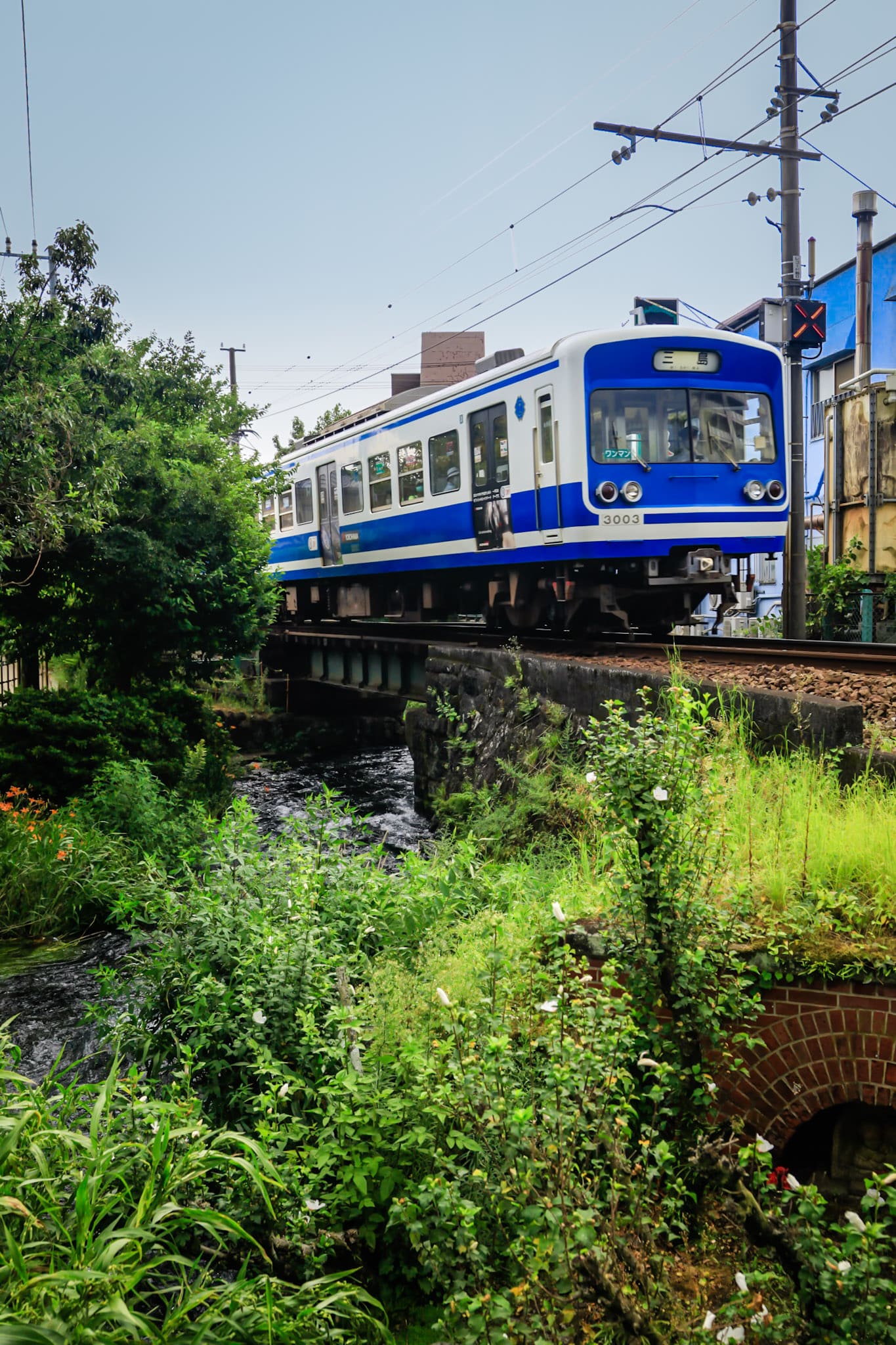 Izuhakone Railway passing over Genbei River in Mishima