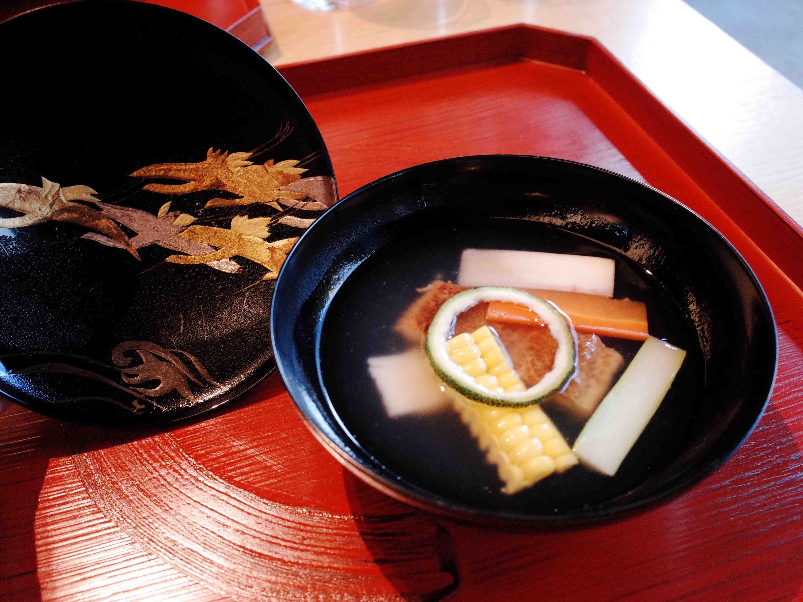 Owan clear soup with yuzu in a lacquered bowl, kaiseki dinner Tokyo