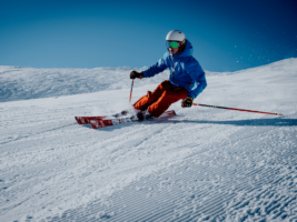 A man skiing on the snow slope